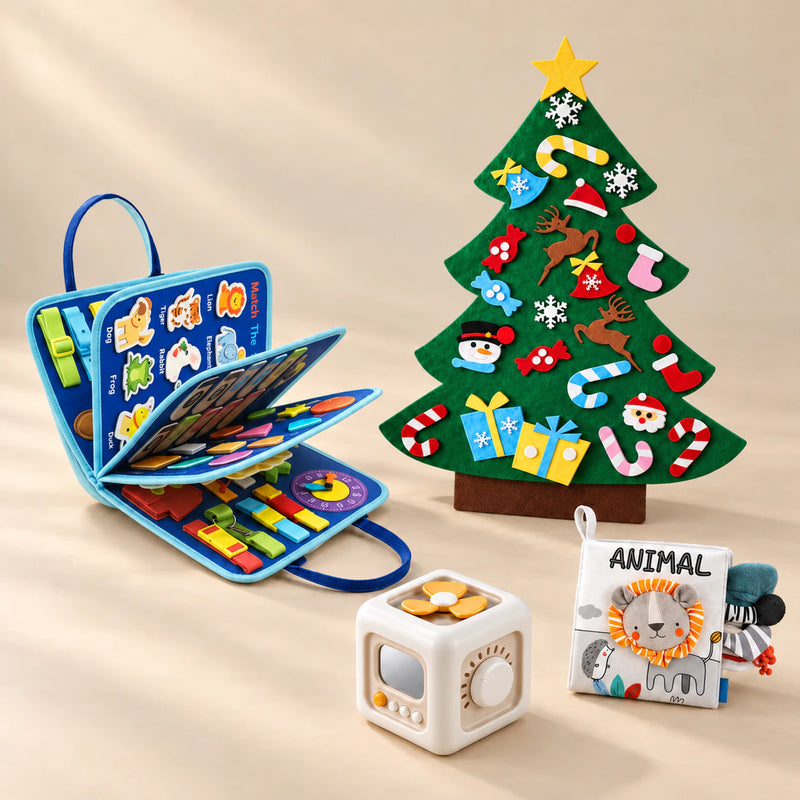 Christmas Wonder Play Bundle with the Vehicle Blue Plus busy board, arranged on a warm beige studio surface.