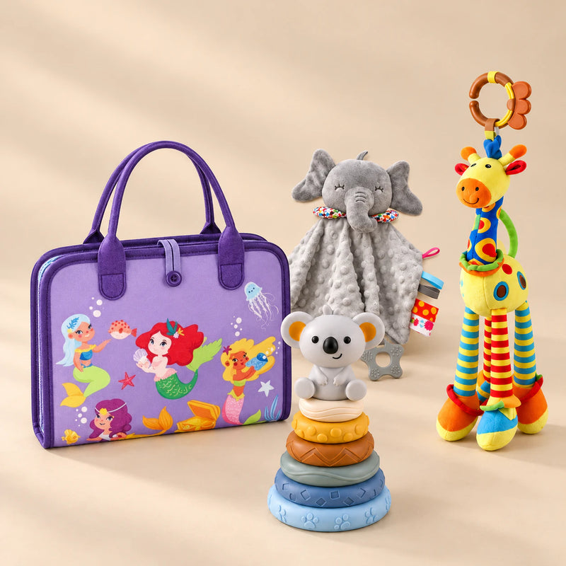 TibaToes™ Christmas Comfort Play Bundle with Mermaid Purple Plus products arranged on a warm beige studio surface.
