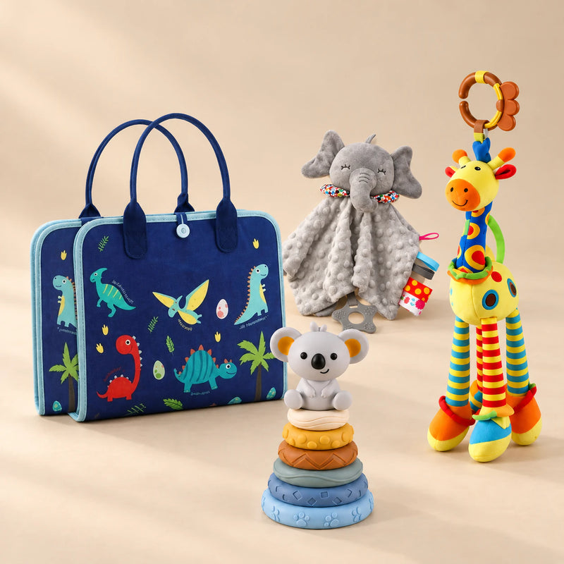 TibaToes™ Christmas Comfort Play Bundle with Dinosaur Blue Plus products arranged on a warm beige studio surface.
