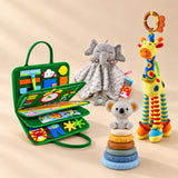 TibaToes™ Christmas Comfort Play Bundle with Dino Green Plus products arranged on a warm beige studio surface.
