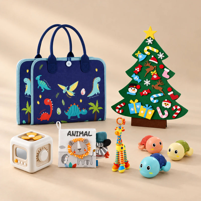 TibaToes™ Christmas Wonder Learning Bundle with Dinosaur Blue Plus products arranged on a warm beige studio surface.