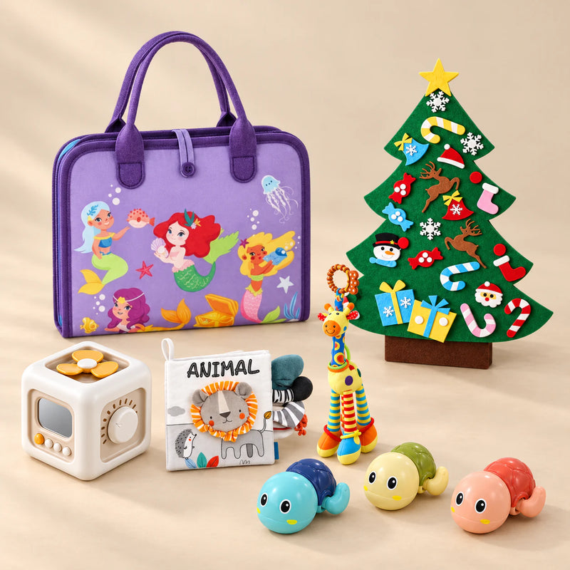 TibaToes™ Christmas Wonder Learning Bundle with Mermaid Purple Plus products arranged on a warm beige studio surface.
