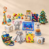 TibaToes™ Ultimate Christmas Play Bundle with Dinosaur Blue products arranged on a warm beige studio surface.