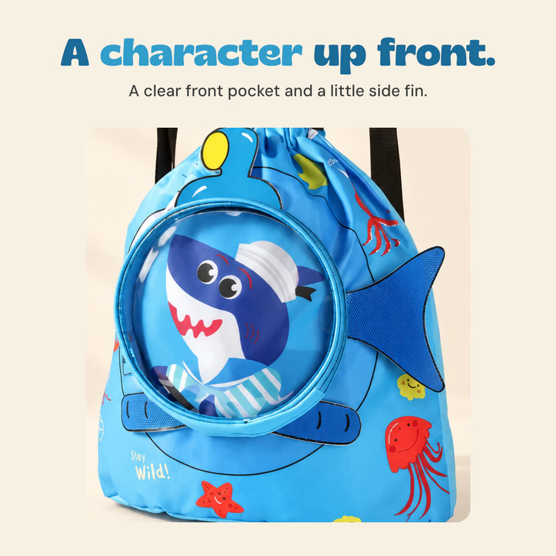 Close view of the blue shark character behind the circular clear pocket and the blue side fin.