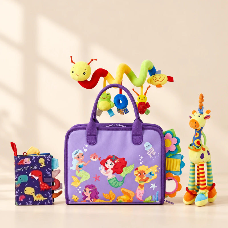 Mermaid Purple Plus Sensory Explorer Bundle with its busy board, dinosaur soft book, giraffe toy and hanging spiral toy on a warm beige background.