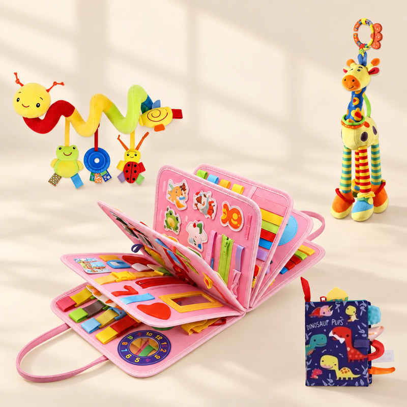 Mermaid Pink Plus Sensory Explorer Bundle with its busy board, dinosaur soft book, giraffe toy and hanging spiral toy on a warm beige background.