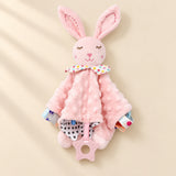 Pink bunny comfort blanket with dotted fabric, spotted lining, colourful edge tabs and a pink star ring.