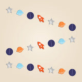 Star Rocket Garland with orange rockets, silver stars and blue, orange and navy planet shapes arranged as one continuous strand.