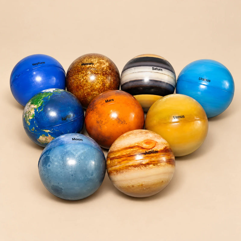 Nine planet-themed balls showing eight planets and the Moon, with no Sun included.