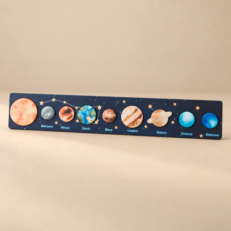 Space Blue solar system puzzle strip with realistic planet artwork.