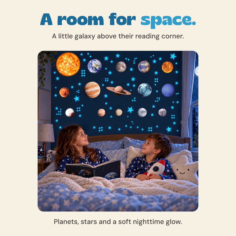 The existing two children share a book beneath blue glowing space stickers. Promotional overlays have been removed.