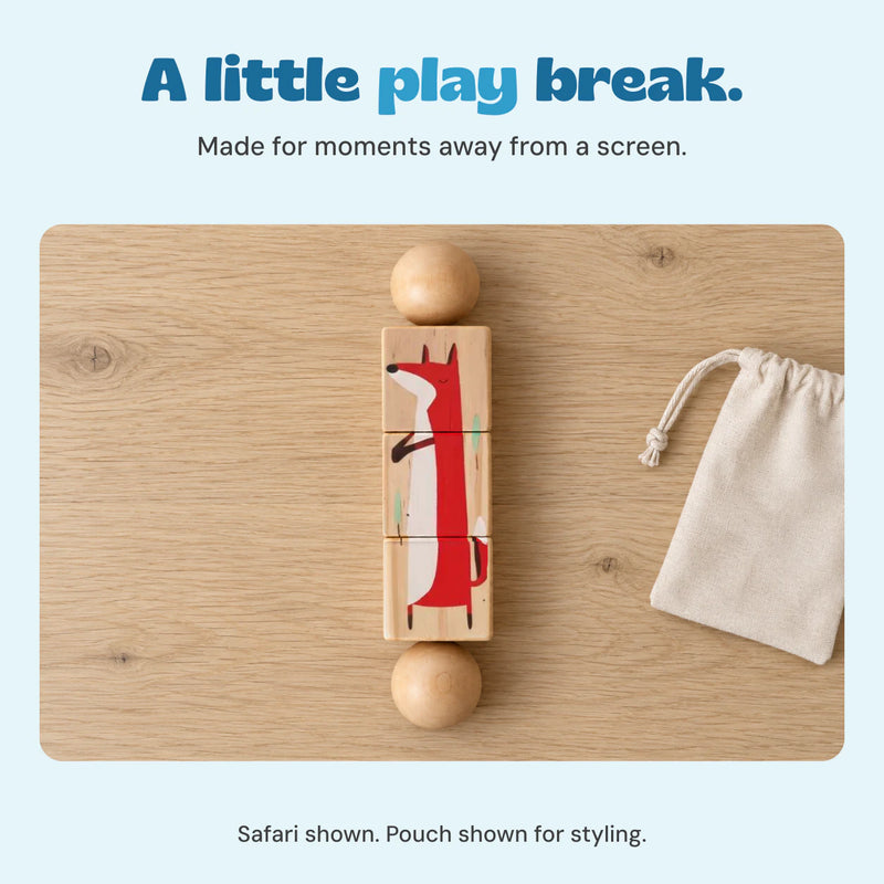 One Safari fox Spin and Match toy lies flat on a pale oak tabletop beside a beige pouch. Pouch shown for styling.