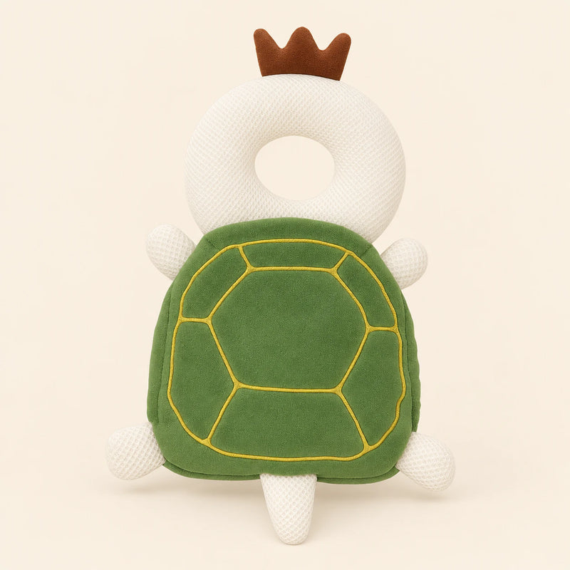 BounceBuddy Green Turtle cushion shown in full on a smooth warm beige background.