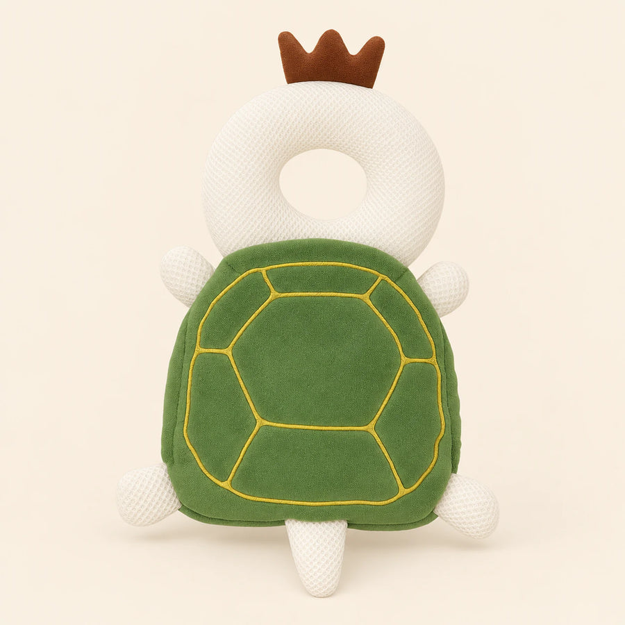 BounceBuddy Green Turtle cushion shown in full on a smooth warm beige background.