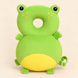 BounceBuddy Green Frog cushion shown in full on a smooth warm beige background.
