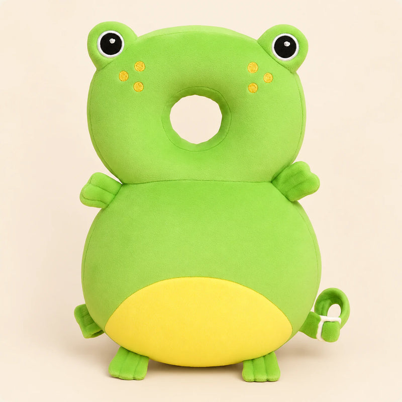 BounceBuddy Green Frog cushion shown in full on a smooth warm beige background.