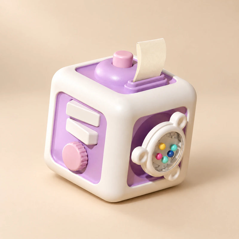 TibaToes Montessori Busy Cube in Starry Space Pup, showing its visible activity panels on a warm beige background.