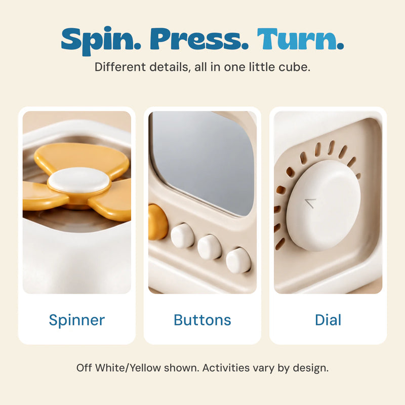Close-up views of the spinner, buttons and dial on the Off White/Yellow TibaToes Busy Cube. Activities vary by design.