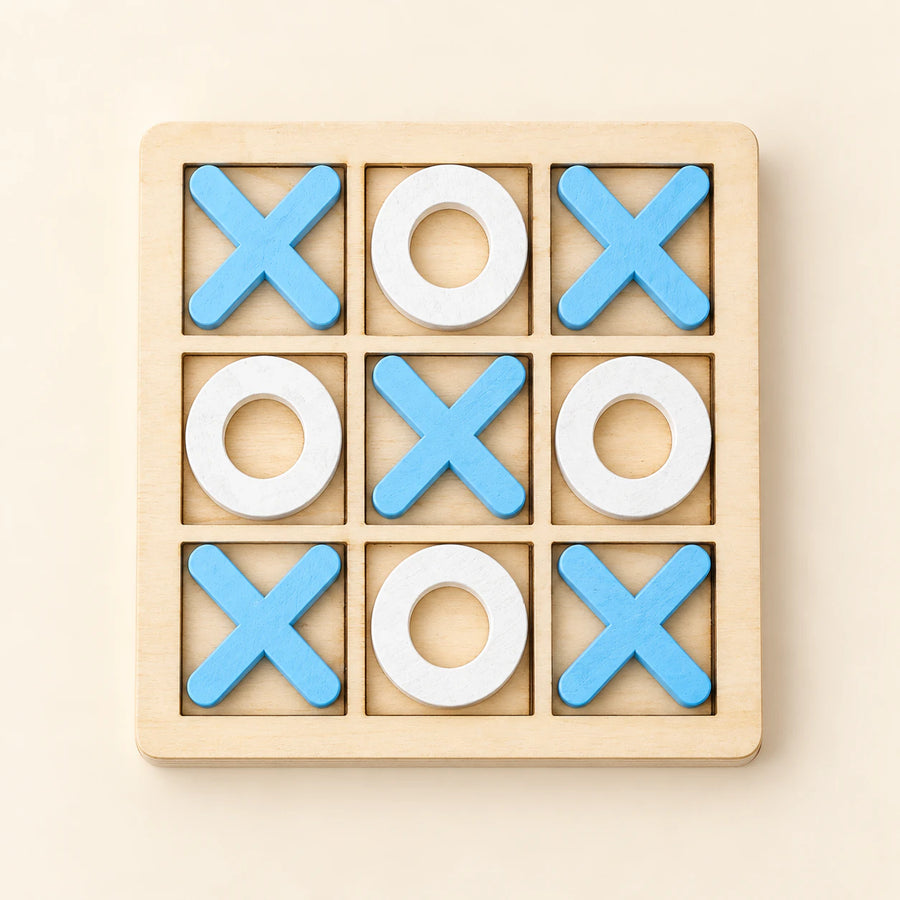 A wooden three-by-three tray with five light blue crosses and four white rings.