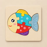 TibaToes Fish wooden puzzle assembled on its square wooden base against a pale warm beige background.