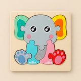TibaToes Elephant wooden puzzle assembled on its square wooden base against a pale warm beige background.