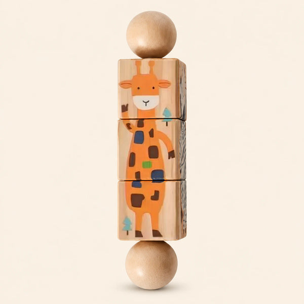Jungle wooden Spin and Match toy with three connected rotating blocks and two wooden ball ends, showing one printed face on smooth pale warm beige.