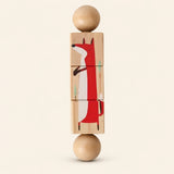 Safari wooden Spin and Match toy with three connected rotating blocks and two wooden ball ends, showing one printed face on smooth pale warm beige.