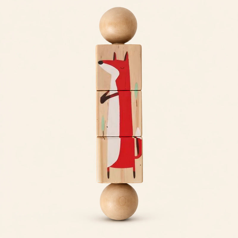 Safari wooden Spin and Match toy with three connected rotating blocks and two wooden ball ends, showing one printed face on smooth pale warm beige.