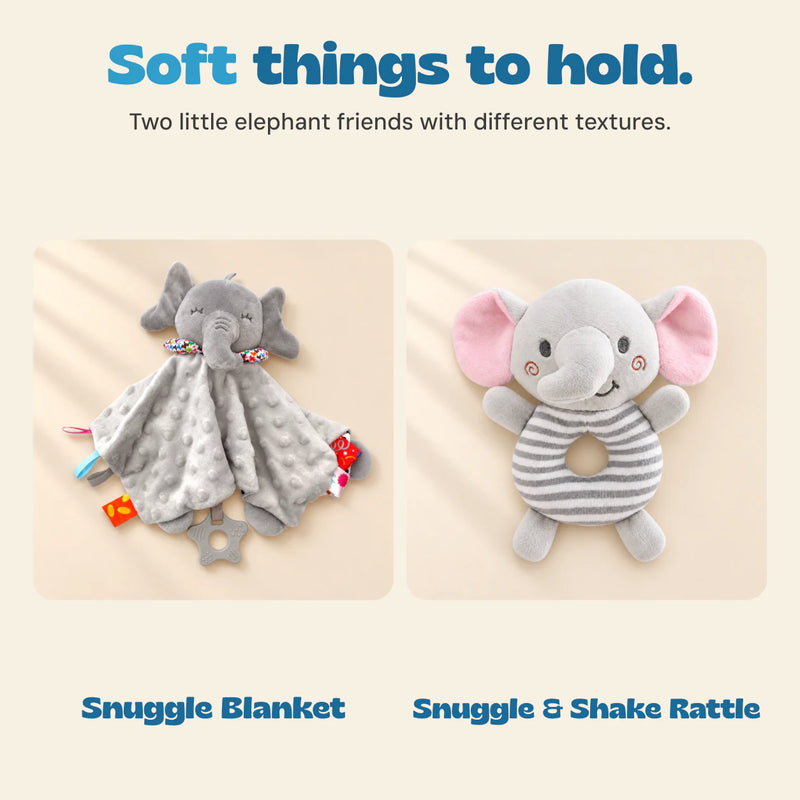 Grey elephant Snuggle Blanket with fabric tabs beside the striped elephant Snuggle and Shake ring rattle.