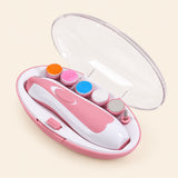 Open pink case with white nail trimmer and six attachments on warm beige.