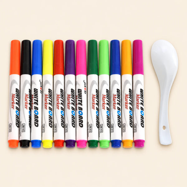 Twelve colourful floating markers and one white ceramic drawing spoon arranged on a warm beige background.
