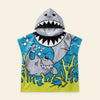 Blue Cloud Plush hooded beach poncho with its original blue shark print on a warm beige background.