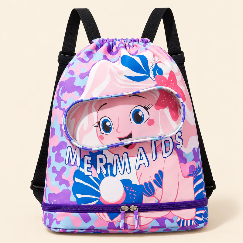 Pink mermaid swim bag with the original MERMAIDS print, clear front pocket, black shoulder straps and lower purple zipper on a warm beige background.