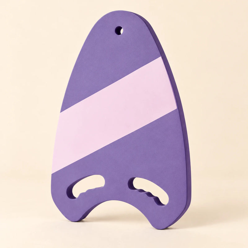 TibaToes™ Kids Swim Board in the photographed purple design on a calm warm beige background.