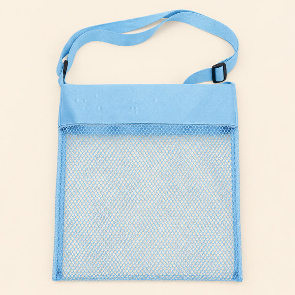 Blue Cloud Plush mesh beach bag shown empty, with matching adjustable shoulder strap and black slider on smooth pale warm beige.