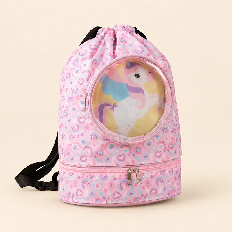 Kids Travel & Holiday Backpack, Unicorn Dreams option on a clean warm beige background.