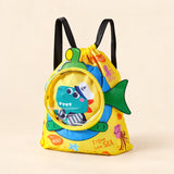 Small yellow dinosaur-print drawstring backpack with black straps, round clear front pocket and side fin.
