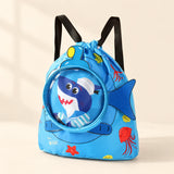 Small blue shark-print drawstring backpack with black straps, round clear front pocket and side fin.