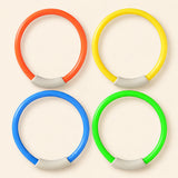 Four orange, yellow, blue and green dive rings with pale curved segments on a warm beige background. This is one separate set choice.