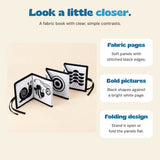 Fabric pages, bold black-and-white pictures and a folding accordion design.