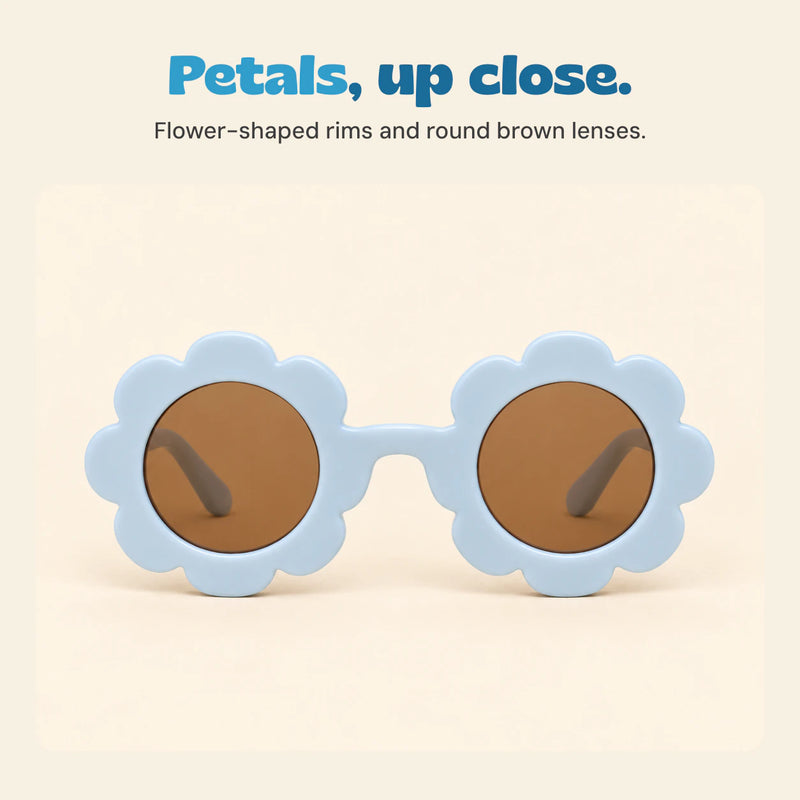 Front view of pale blue sunglasses with petal-shaped rims and brown round lenses.
