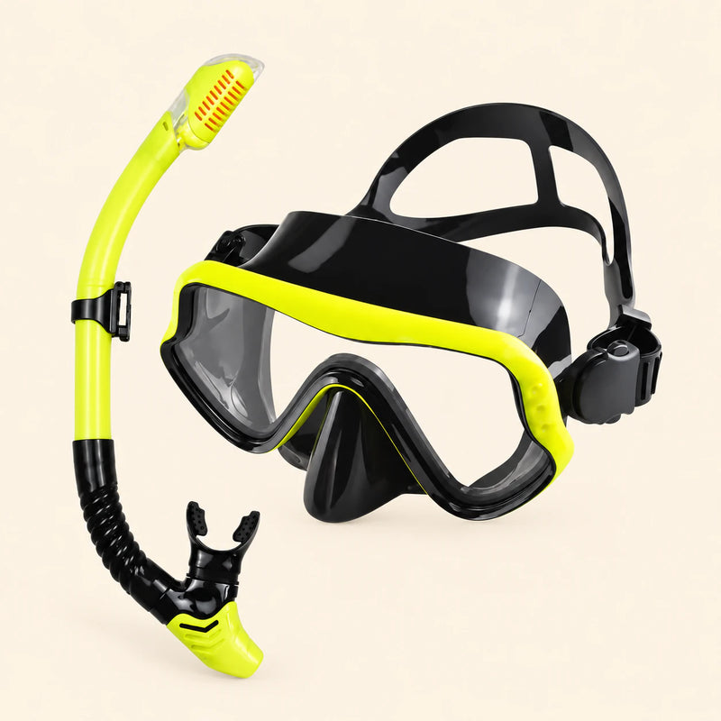 A mask and separate matching snorkel in the Yellow Honey Bee option on a warm beige background.