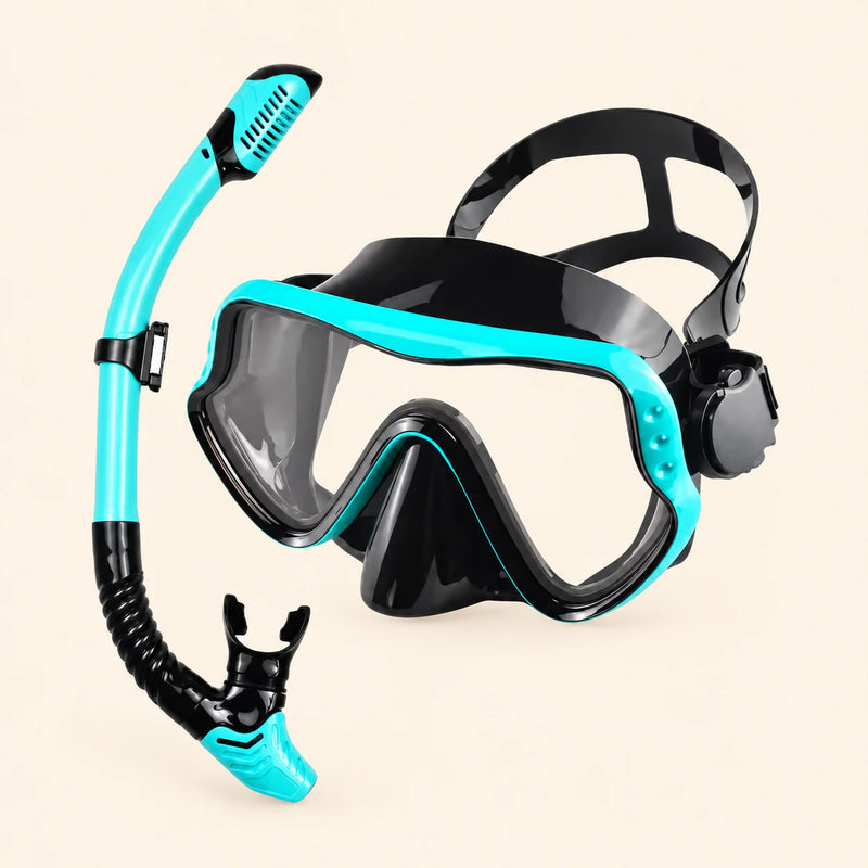 A mask and separate matching snorkel in the Turquoise option on a warm beige background.