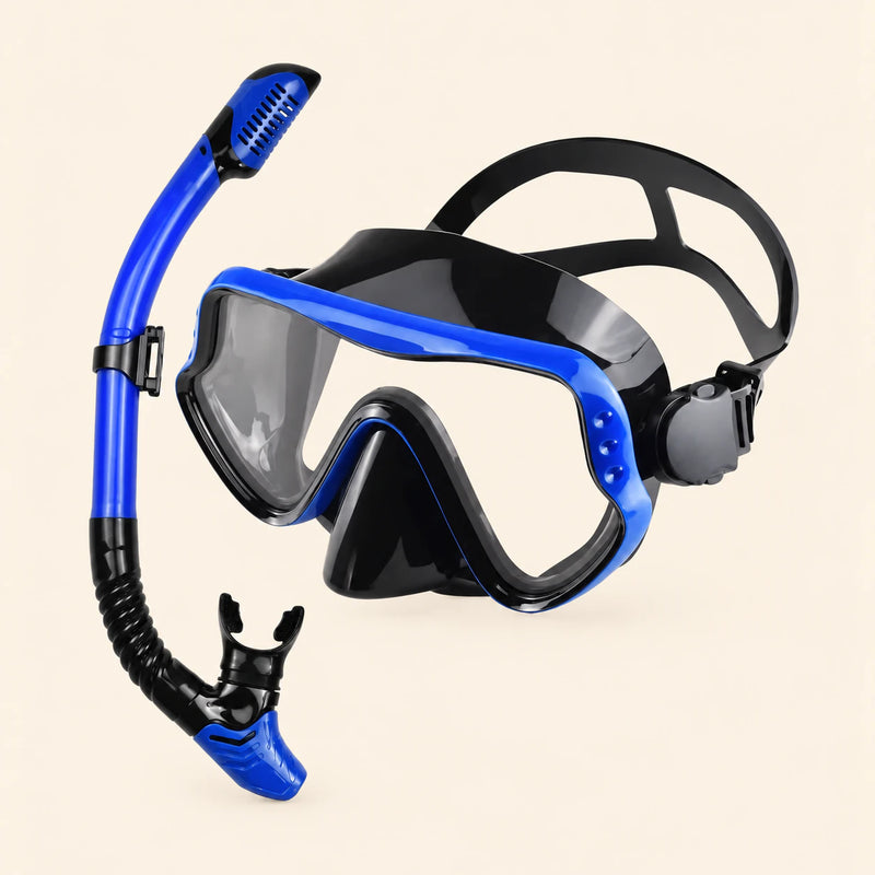 A mask and separate matching snorkel in the Dolphin Blue option on a warm beige background.