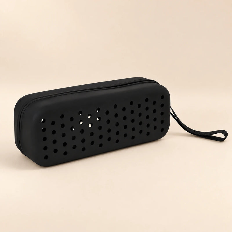Ocean Octopus goggle case with ventilation holes and matching carry loop on a smooth warm beige background.