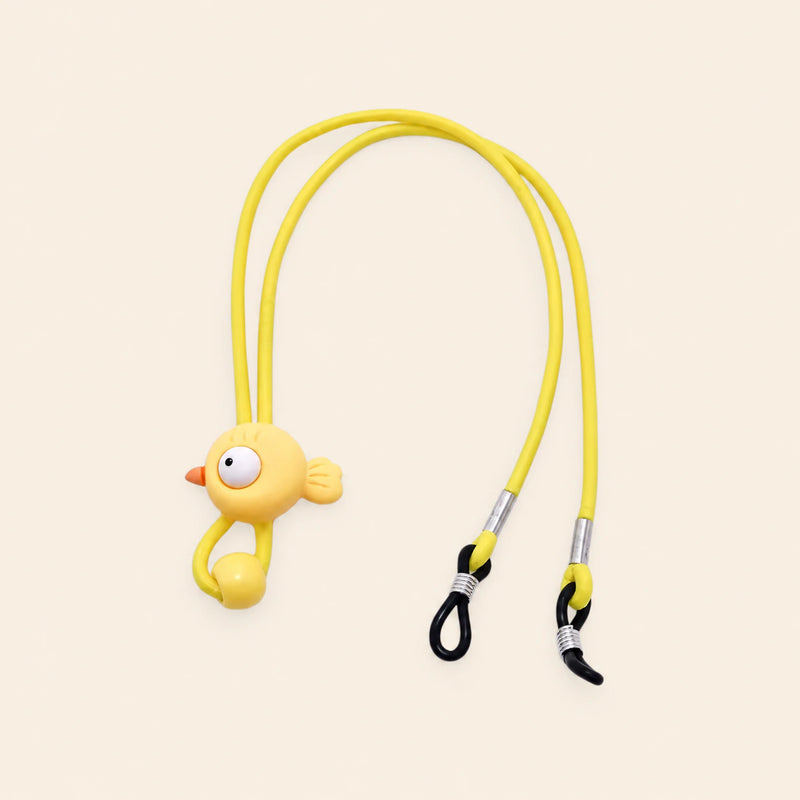Yellow cord with bird charm, sliding bead and two adjustable black end loops on a warm beige background.