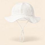 TibaToes™ CloudShade Hat, White option on a clean warm beige background.