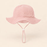 TibaToes™ CloudShade Hat, Baby pink option on a clean warm beige background.