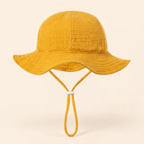 TibaToes™ CloudShade Hat, Yellow Honey Bee option on a clean warm beige background.