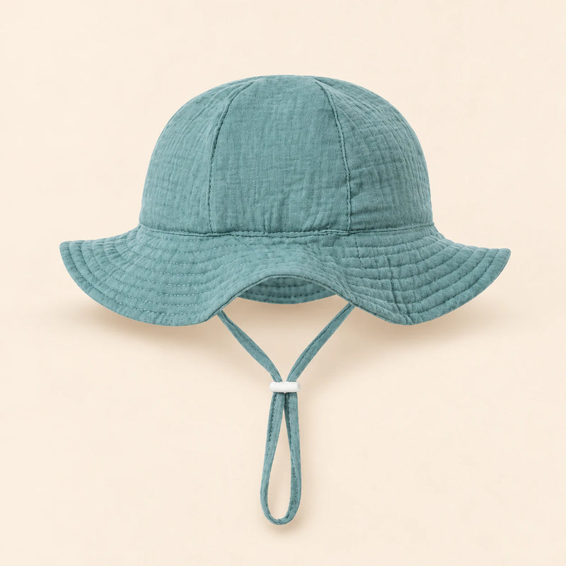 TibaToes™ CloudShade Hat, Sage Meadow option on a clean warm beige background.